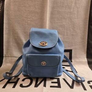 Coach Blue Leather Backpack
Inside with some stain from normal use .